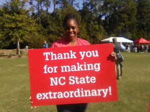  NC State Student holding thank you sign 